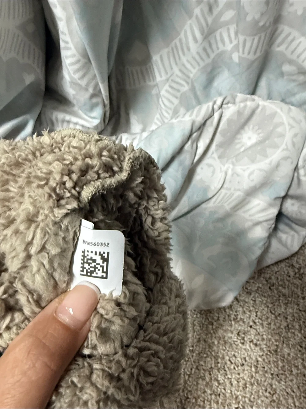 The North Face Kids Teddy Fleece Beanie Hat in Taupe with White Ear Accents. 3-6